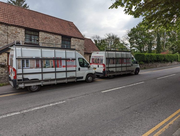 BS15Doors branded vans in front of a house - BS15Doors & Windows